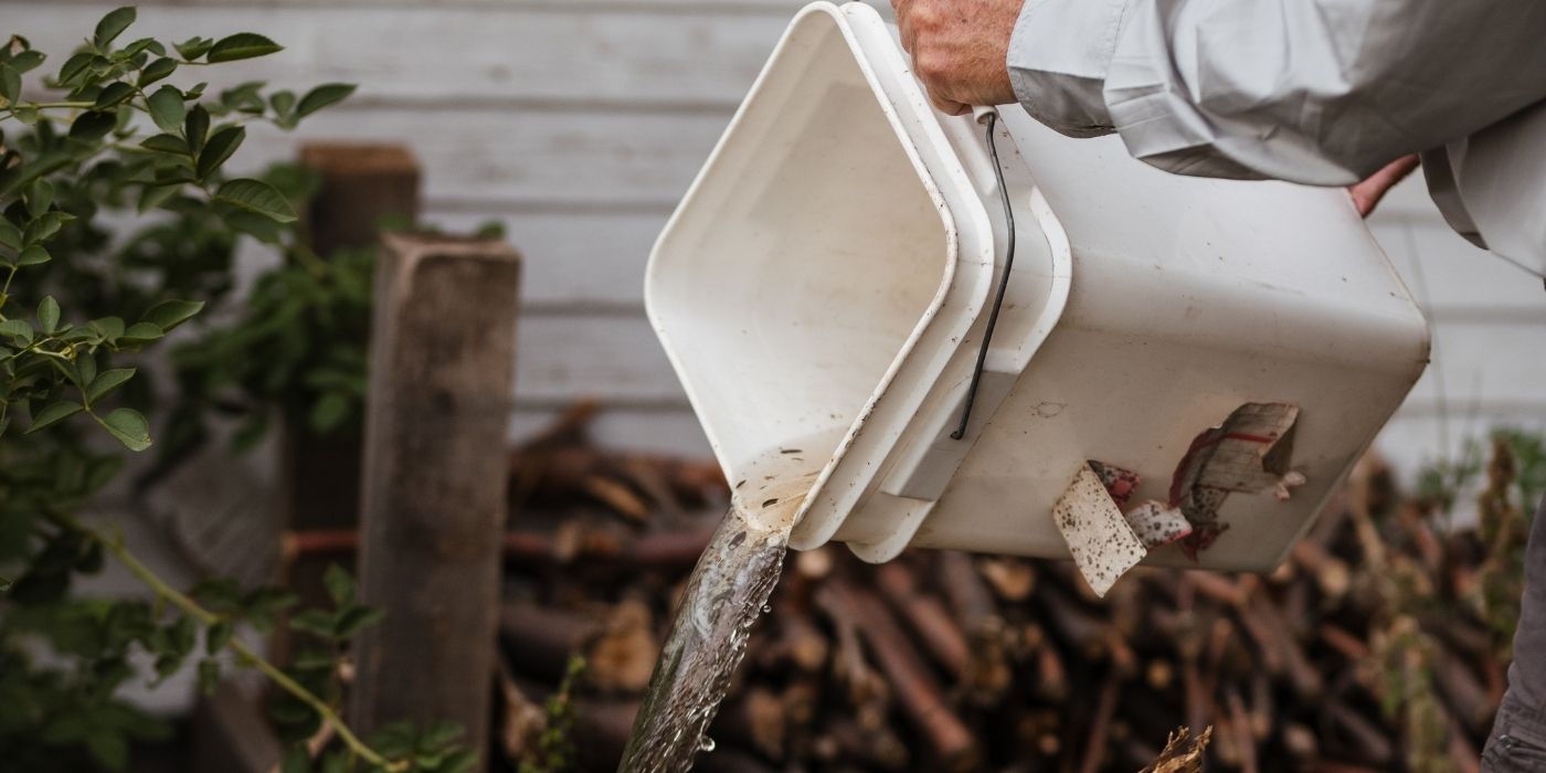 dumping-standing-water-reduce-mosquito-breeding-sites