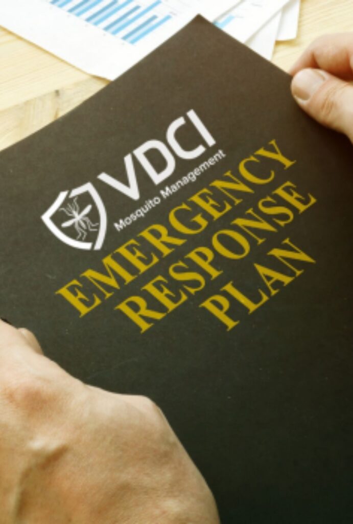person holding a document from VDCI Mosquito Management to create a personal Emergency Response Plan