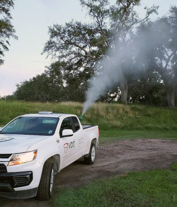 truck spraying mosquito adulticide